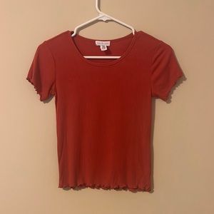 Precious girl’s top with cute ruffled detailing